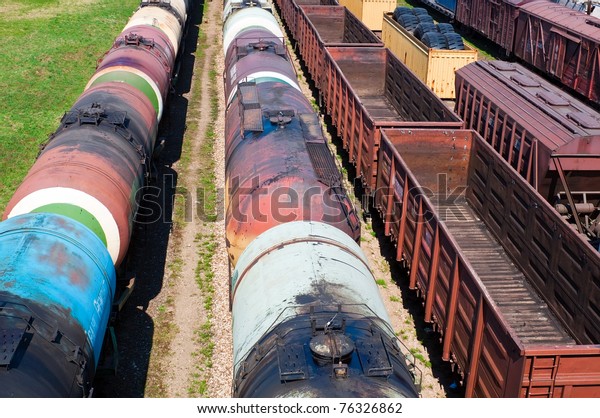 Cargo train containers on\
sunny day