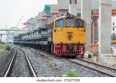 Cargo train platform at sunset with container , tank