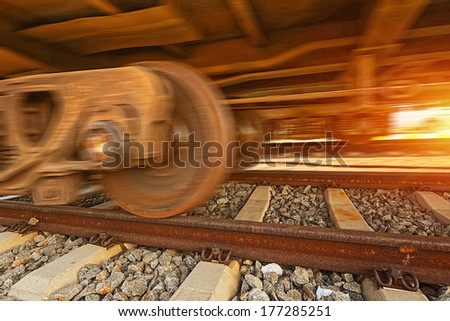 Cargo train platform at sunset with container