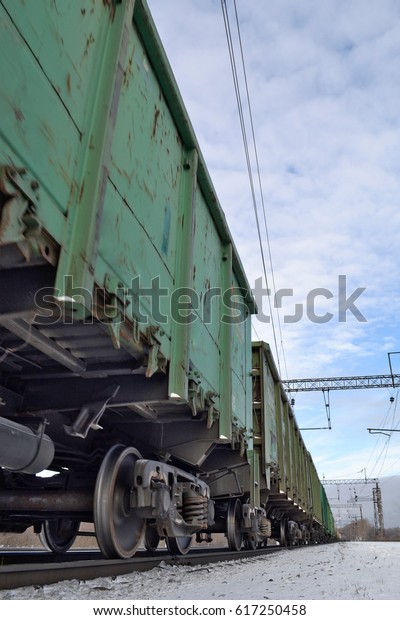 Cargo train with tank\
cars on the tracks