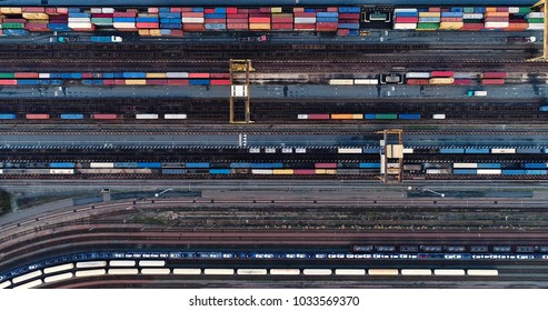 Cargo Trains And Containers At A Terminal