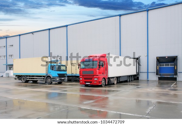 Cargo truck at warehouse\
building