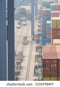 Cargo Trucks And Containers Vessels In Nhava Sheva Port.