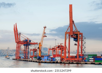 cargo unloading port of international transport vessels - Shutterstock ID 2311247299