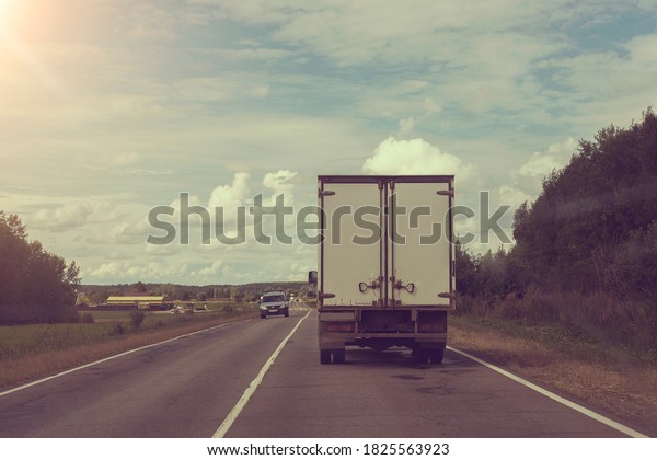 cargo van on the\
highway in the\
countryside