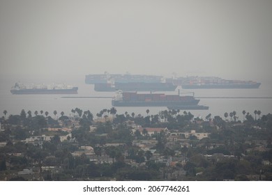 Cargo vessels dock off the California coast. - Shutterstock ID 2067746261