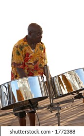 A Caribbean Musician Playing His Steel Drums.