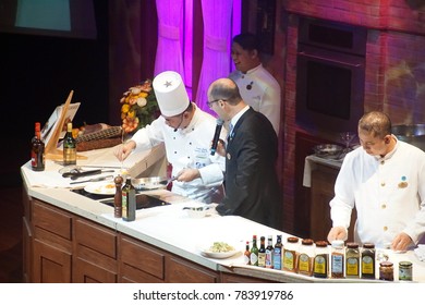 CARIBBEAN SEA - DEC 20, 2017 - Head Chef And  Maitre D' Present A Culinary Show On A Cruise Ship In The  Caribbean Sea