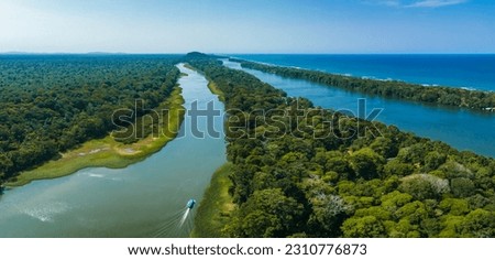 Caribbean sea on the one side, village Tortuguero inside the jungle in the middle, and huge river on the otjer side. Amazing place full of wildlife in Costa Rica