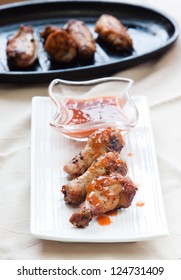 Caribbean Style Jerk Chicken Wings. Shallow Focus On The Chicken.