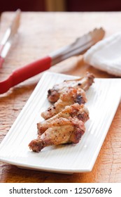 Caribbean Style Jerk Chicken Wings. Shallow Focus On The Chicken.