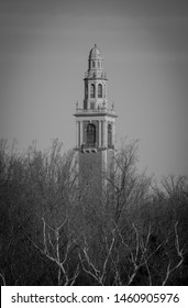 The Carillon in Richmond Virginia behind leafless trees in black and white.
