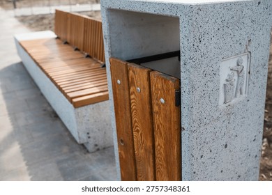 Caring about an enviroment, separating garbage into different continers. Garbage bins for separate waste sorting in park. Separate garbage collection containers on a park. Collection of plastic, paper, glass and mixed wasted for further processing