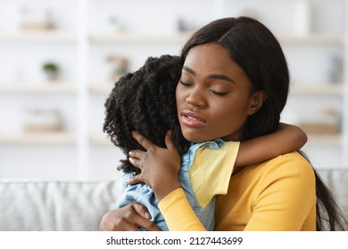 Caring African American Woman Hugging Little Daughter, Comforting Her Upset Child, Closeup Shot Of Loving Black Mother Embracing Female Kid At Home, Loving Mommy Soothing Crying Girl, Free Space - Shutterstock ID 2127443699