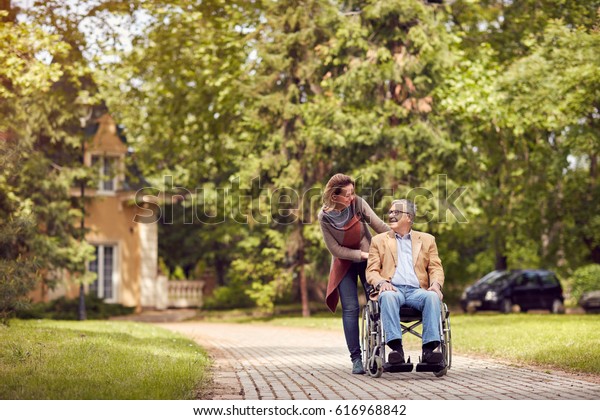 Caring Daughter Senior Man Wheelchair On Stock Photo 616968842 ...