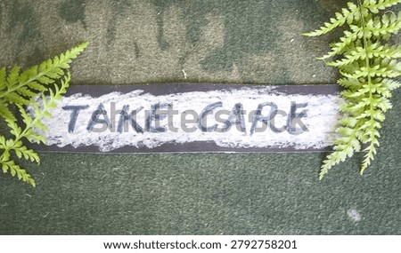 Caring message surrounded by natural greenery.