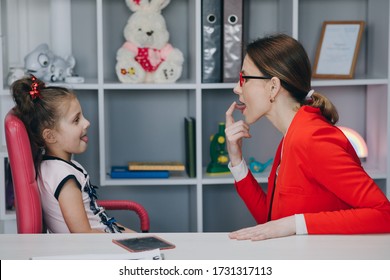 Caring Mom Or Female Speech And Language Therapist Teaching Stuttering Cute Preschooler Child Girl Daughter Learning Correct Pronunciation Having Stutter Difficulty Voice Ability Problem Concept