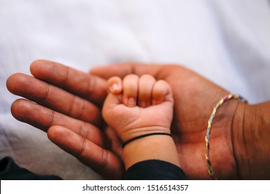 Caring New Born Baby Hand 