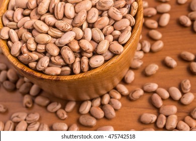 Carioca Beans Into A Bowl Over A Wooden Table