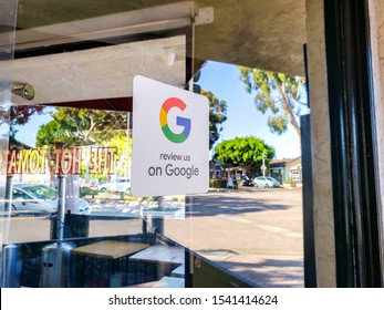 Carlsbad, California/United States - 10/08/2019: A Retail Store Window Sticker Advertising To Guests And Customers To Provide Reviews On Google Maps