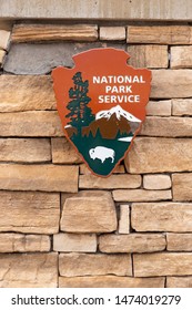 Carlsbad, NM / USA - July 11, 2019: National Park Service Logo On Rock Sign