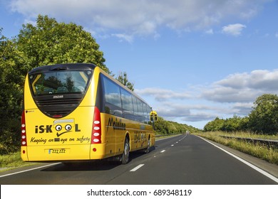 Carmarthen, UK: July 05, 2016: A Yellow School Bus Is Taking The Children Home From School. 