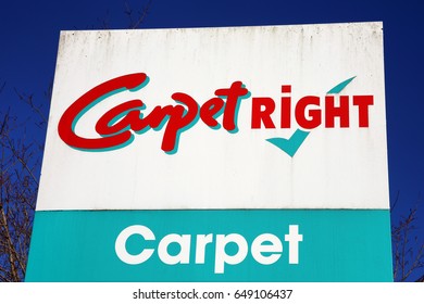 Carmarthen, Wales, UK – January 2, 2017:  Carpetright logo advertising sign at its retail supermarket stores in just outside the town centre