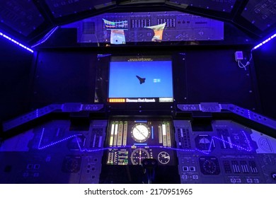 CARNARVON, WA - MAY 06 2022:Cockpit Of A Fighter Aircraft Flight Simulator, A Device That Artificially Re-creates Aircraft Flight And The Environment In Which It Flies, For Pilot Training Purposes.