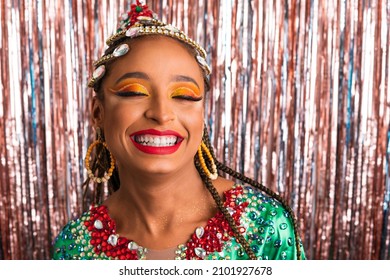 Carnaval in Brazil, cheerful black woman in carnaval costume at brazilian party with fashion makeup - Shutterstock ID 2101927678