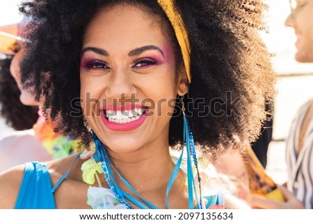 Carnaval Party in Brazil, portrait of woman enjoying brazilian event in costume