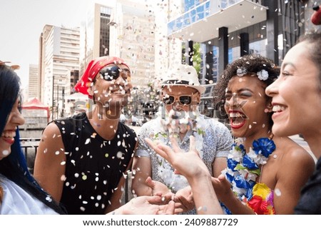 Carnaval party. Crowd of Brazil people in costume celebrating in parade festival. Happy brazilian partygoers in costume having fun in parade festival.