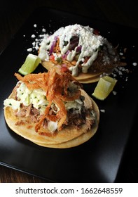 Carnitas And Pulled Chicken Taco’s Dish On Table