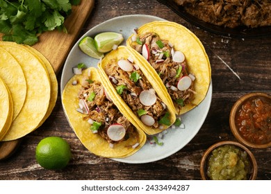 carnitas tacos with salsa and lime - Powered by Shutterstock