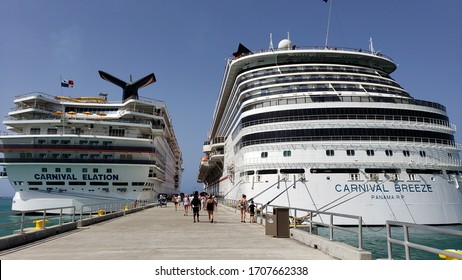 Carnival Breeze Cruise Liner And Carnival Elation Are Moored At The Port Of Amber Cove, Dominican Republic. April 12, 2020