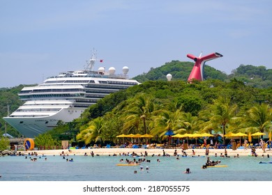 Carnival Cruise Line Funnel Among The Bushes And A Trees In Honduras Harbor By The Sandy Beach. June 20, 2022, Isla Roatan, Honduras