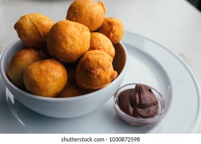 Carnival Fritters Or Donuts Or Bunuelos Served With Cream For Breakfast. Traditional Montenegro Food - Pringice.