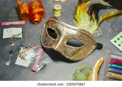 Carnival Mask In The Process Of Decoration And Materials For Its Decoration. DIY Masquerade Mask For Mardi Gras, Fat Tuesday.