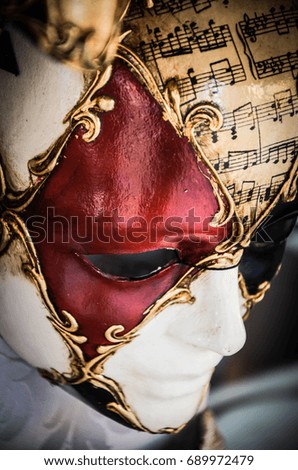 carnival masks on the historical & beautiful streets of Venice   