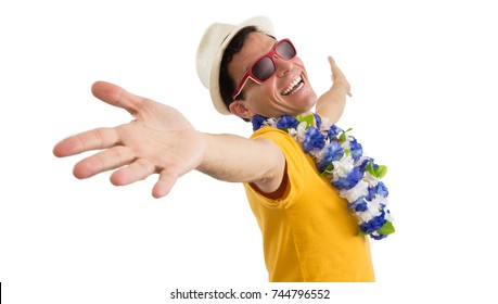 Carnival. Nice Man Is Welcoming. Brazilian Inviting For Traditional Holiday: Carnaval. He Is Wearing Sunglasses And Hat. Flower Necklace. He Is Wearing A Yellow Jersey. Isolated On White Background.