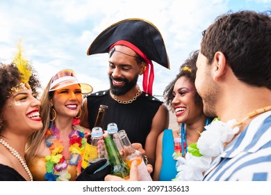 Carnival Party in Brazil, brazilian young people toast at street festival dressed - Shutterstock ID 2097135613