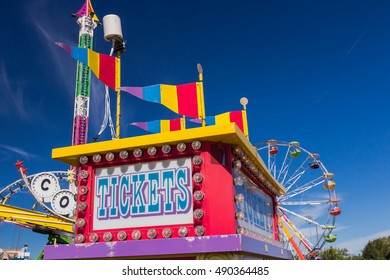 Carnival Ticket Booth And Rides.