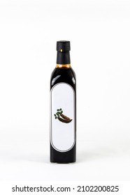 Carob Molasses In A Black One Liter Bottle
