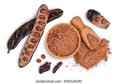 Carob pod and powder isolated on white background with clipping path and full depth of field. Top view. Flat lay - Shutterstock ID 1941144190