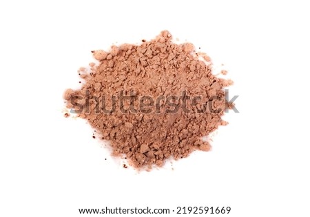 Carob powder pile isolated. Ceratonia siliqua powdered seeds, carob flour on white background top view