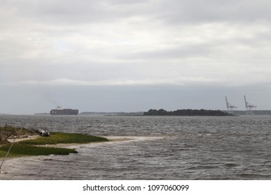 Carolina Beach, NC - April 14 2018: A Cargo Ship Nears The Wilmington Port.