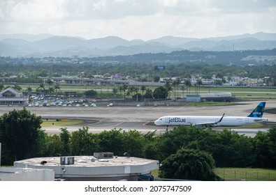 Carolina, Puerto Rico United States - Oct. 30, 2021: A JetBlue Airplane Waits On The Tarmac At Luis Muñoz Marin Airport Before Taking Off. 