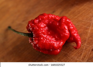 Carolina Reaper On Wooden Table