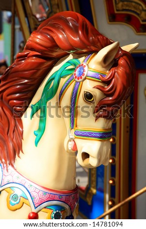 Carousel horse ride at amusement park