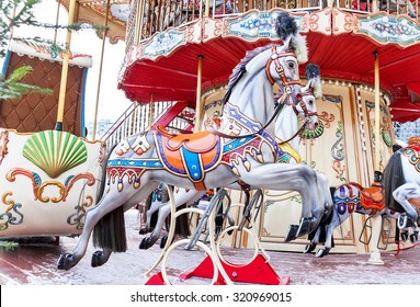 Carousel! Horses On A Vintage, Retro Carnival Merry Go Round. Closeup Of A Colorful  Merry-go-round (roundabout) With Horses. Entertainment, New Year (christmas), Childhood Concept. 