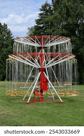  Carousel in a Tranquil Park Setting with Blue Sky.